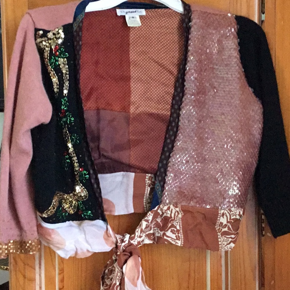 Chic mixed print and fabric wrap around shrug. Great Festive Holiday attire!!